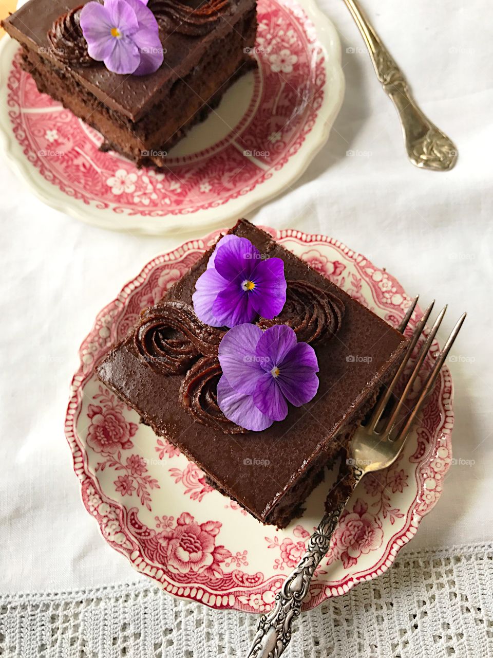 Chocolate cake on white tablecloth
