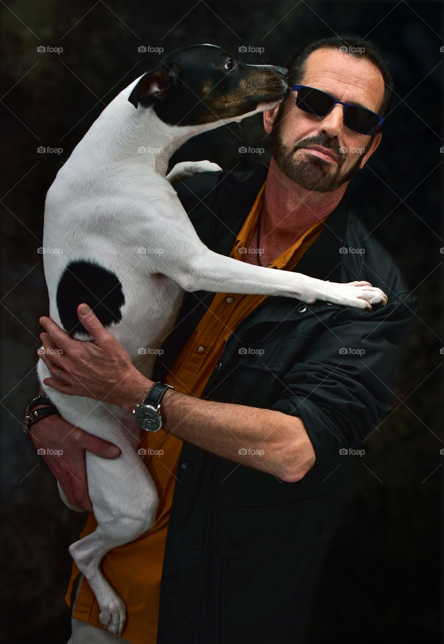 man with his dog in his arms, Man's Best Friend