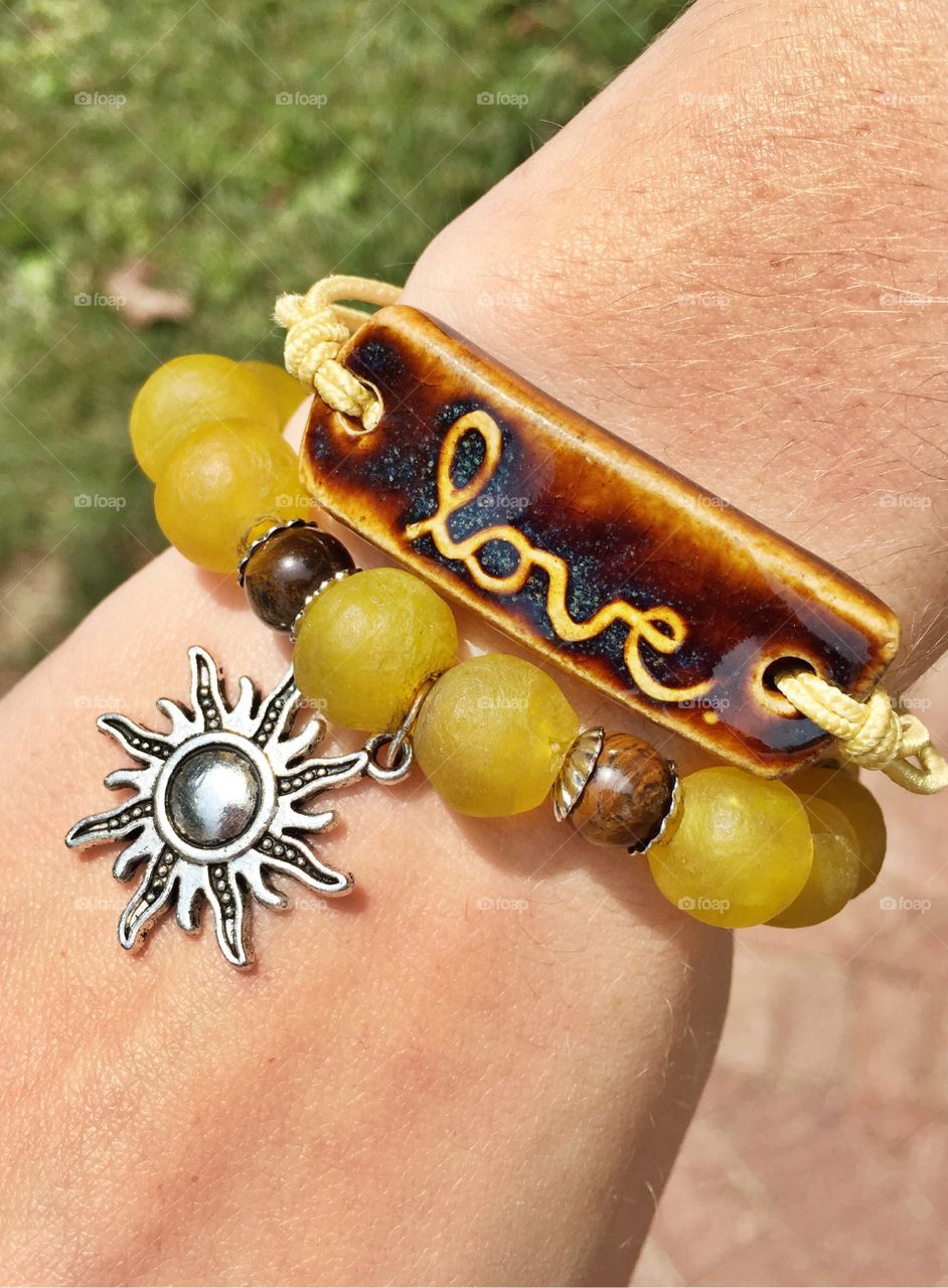 Love. Mud Love donates a certain amount of each sale to help those in need receive clean water. Good Beads uses recycled glass