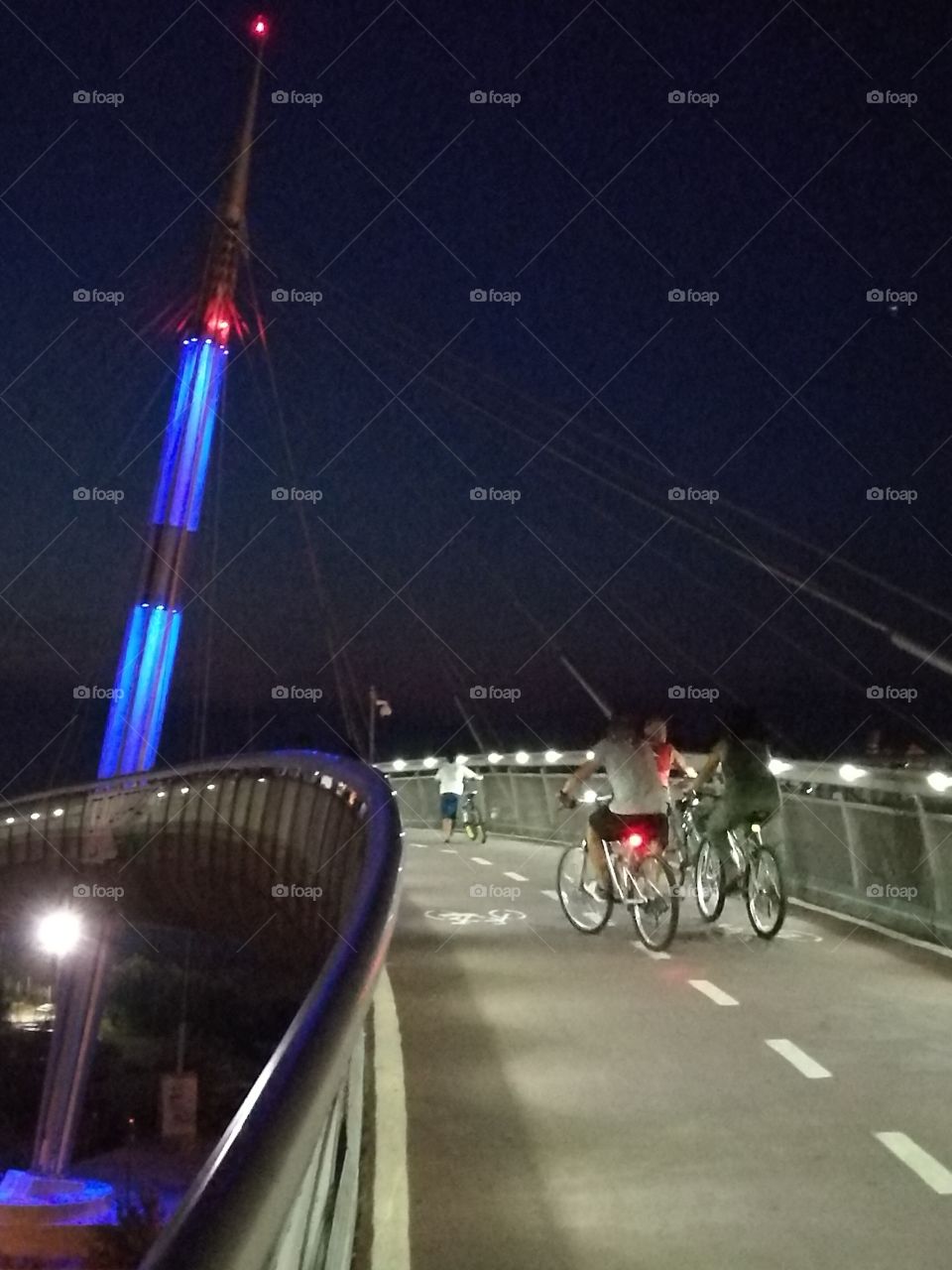 bridge, obelisk, bikers.