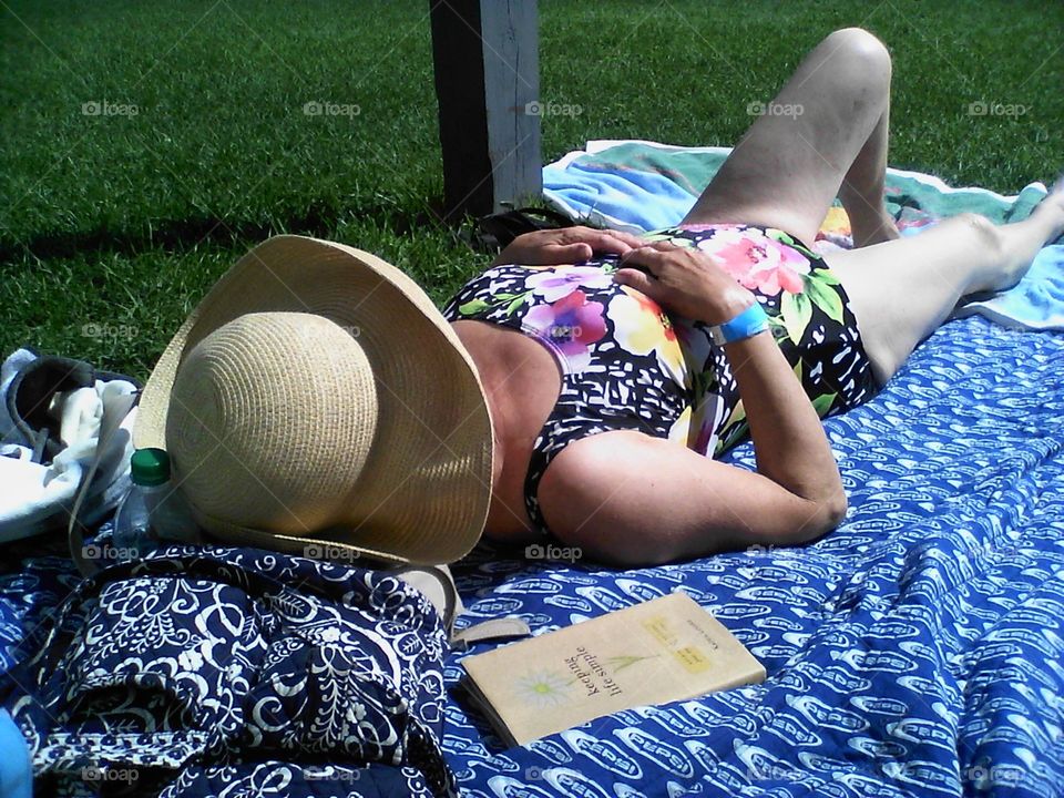 sunbathing....
my mom taking in the sun at the lake