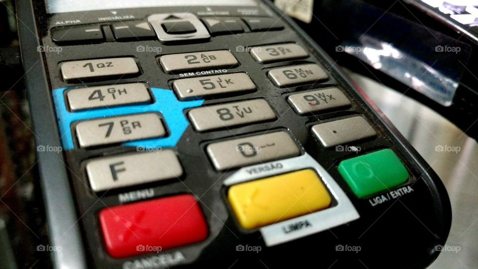 Máquininha para cartões de créditos.