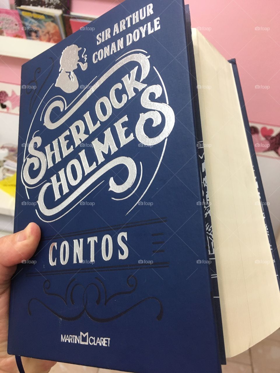 Reading a Sherlock Holmes book is a challenge to intelligence.  And with 1319 pages?  Wow!! / Ler um livro de Sherlock Holmes é um desafio à inteligência. E com 1319 páginas? Uau!