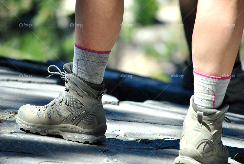 Hiking shoes, boots on top of mountain