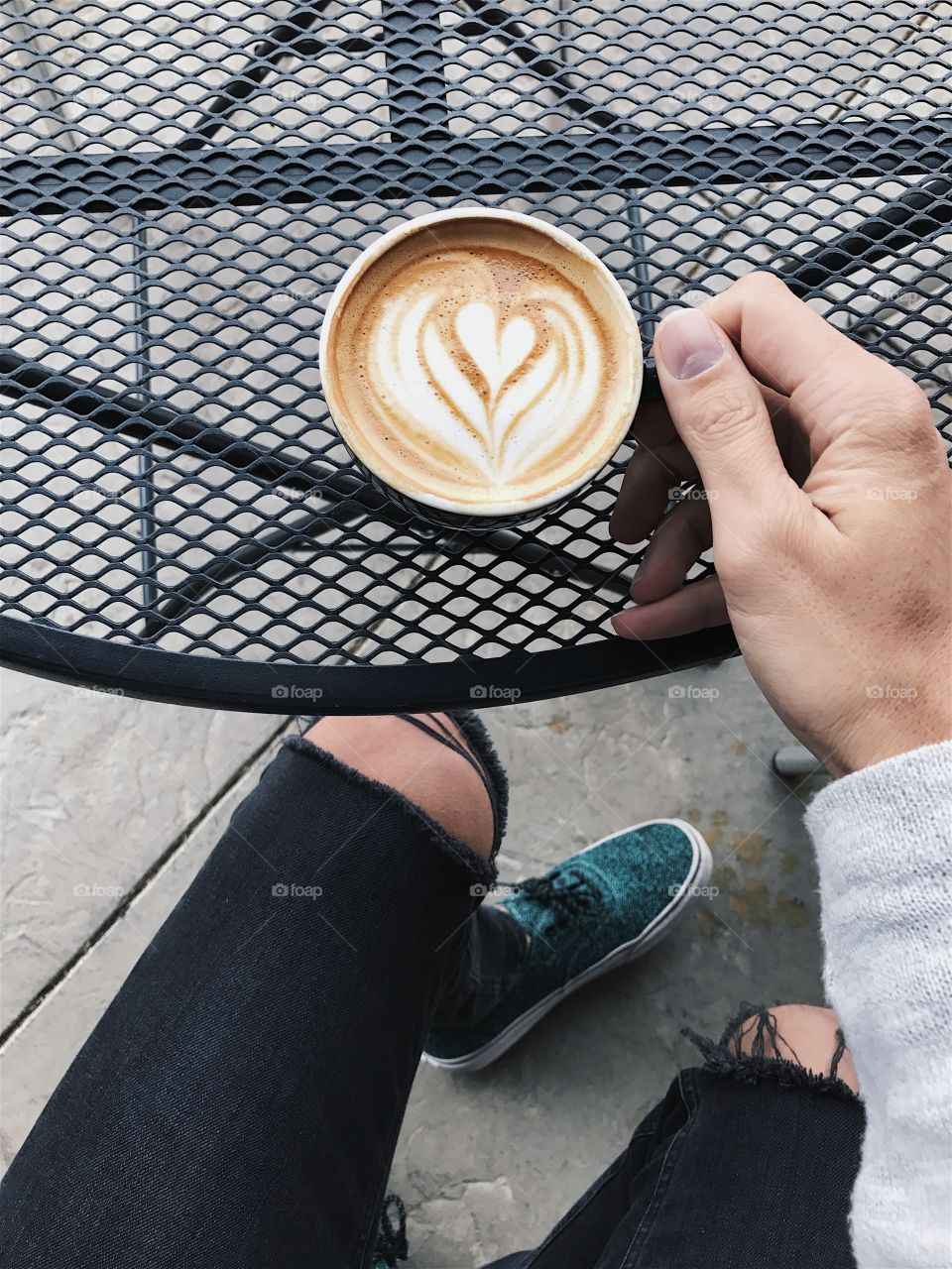 Having a cappuccino outside. 