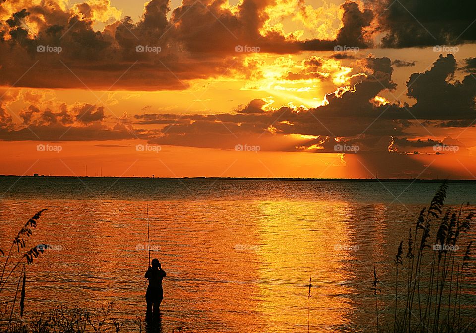 Fishing in the sunset