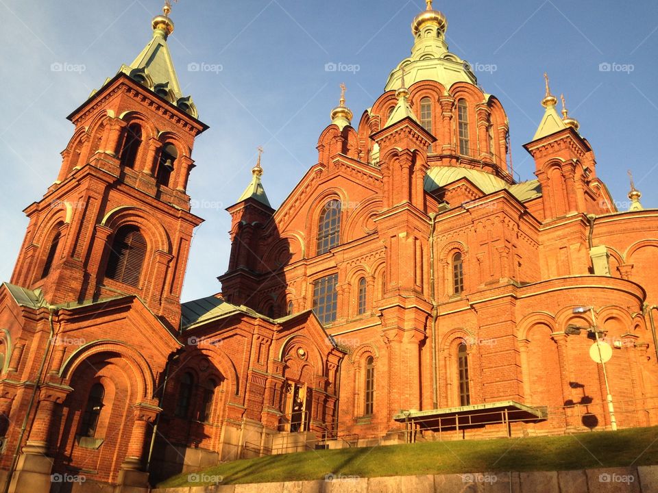 Sun kissed cathedral . Uspenski cathedral at sun rise 