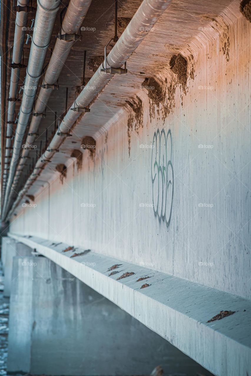Bridge structure and graffiti.
