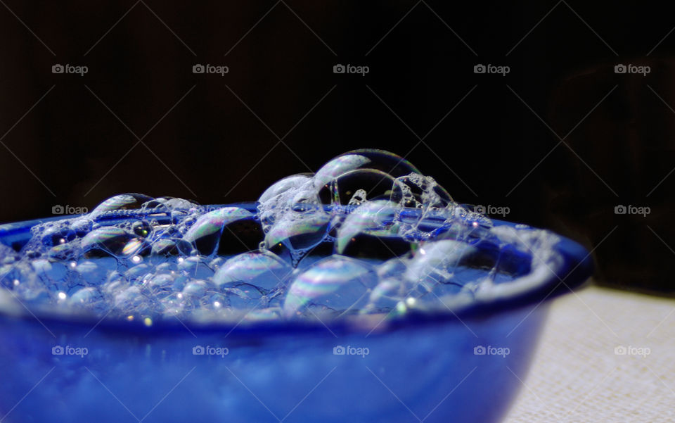 Soap suds against black background