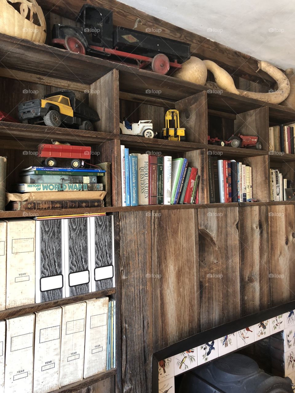 Barn board bookshelves with childhood memories