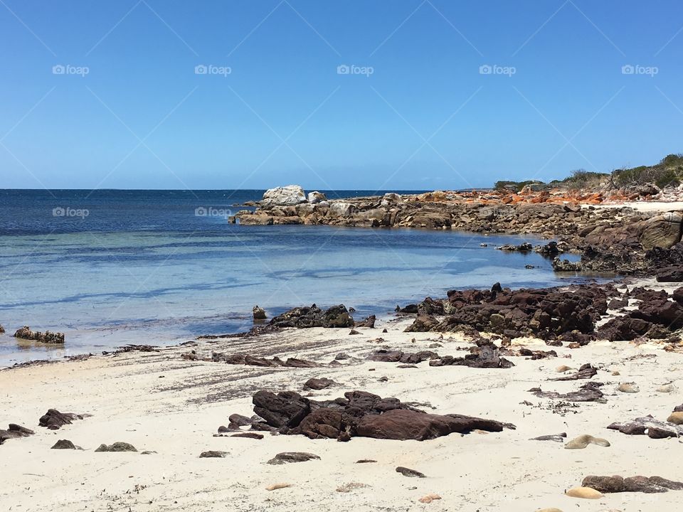 Secluded ocean cove and cliffs on remote beach in south Australia 