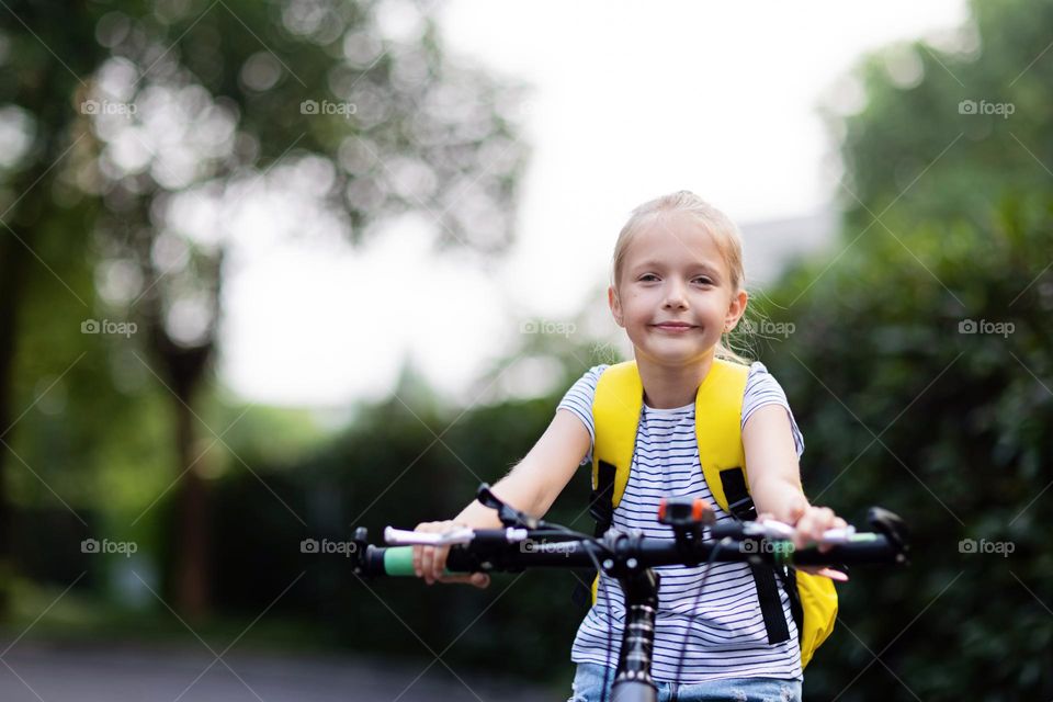 Kid riding on bicycle 