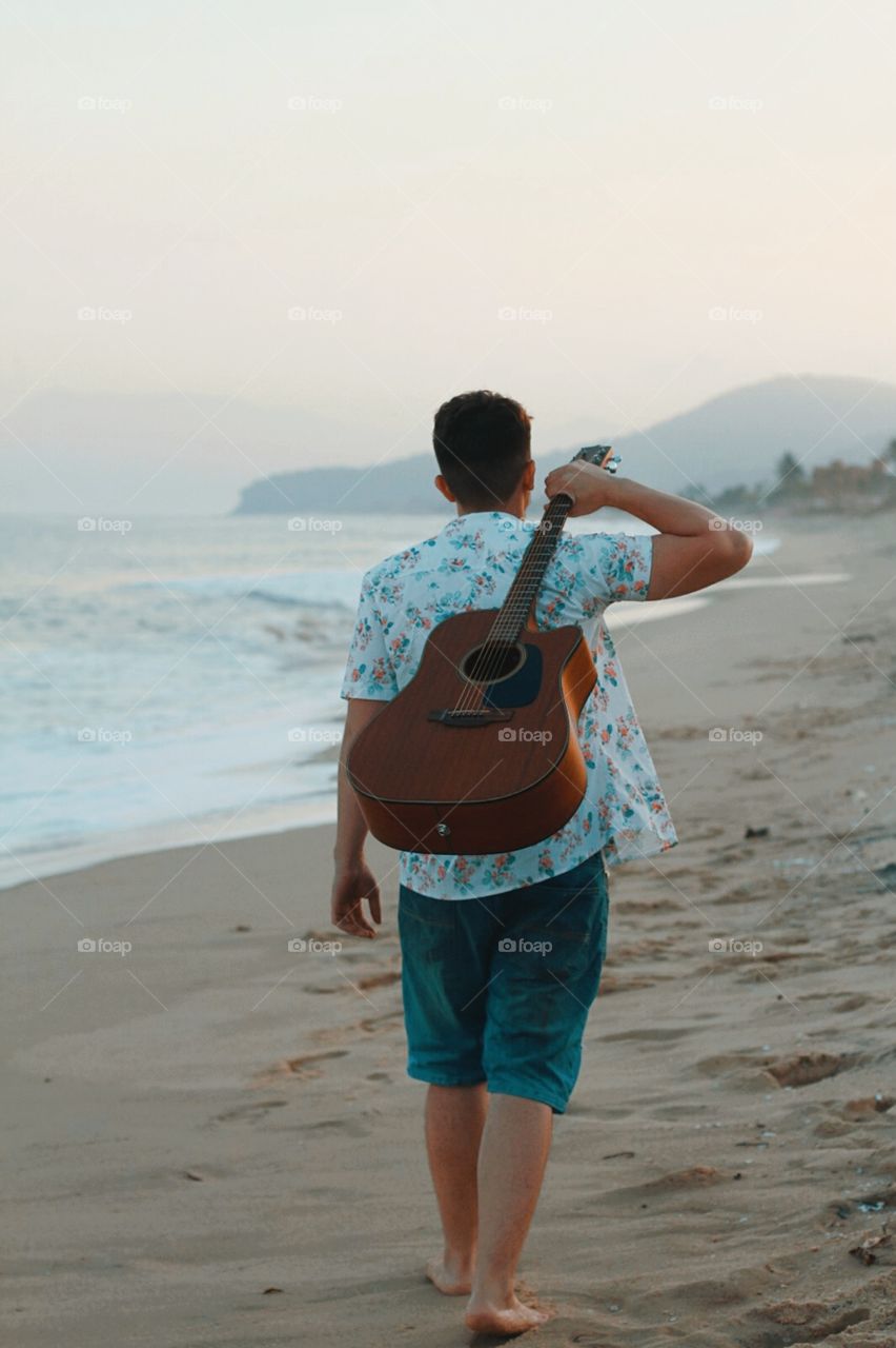 the boy with his guitar