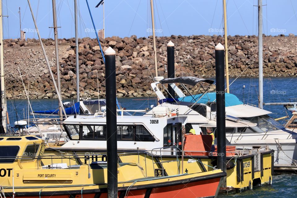 Inner harbour marina surround by rock Jetty 