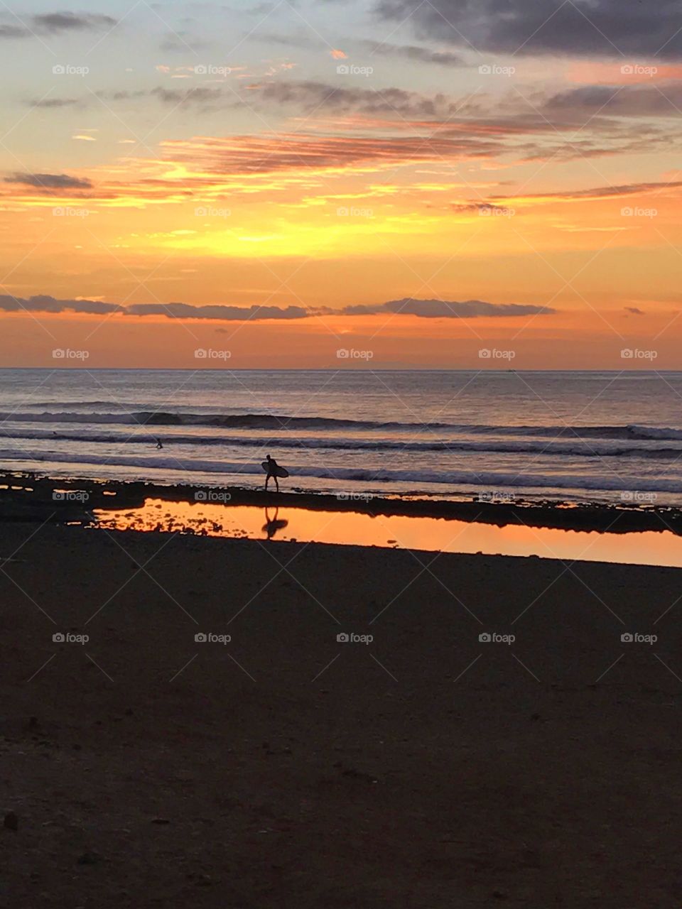 Surfer at a beach in Tenerife, Canary Islands. 