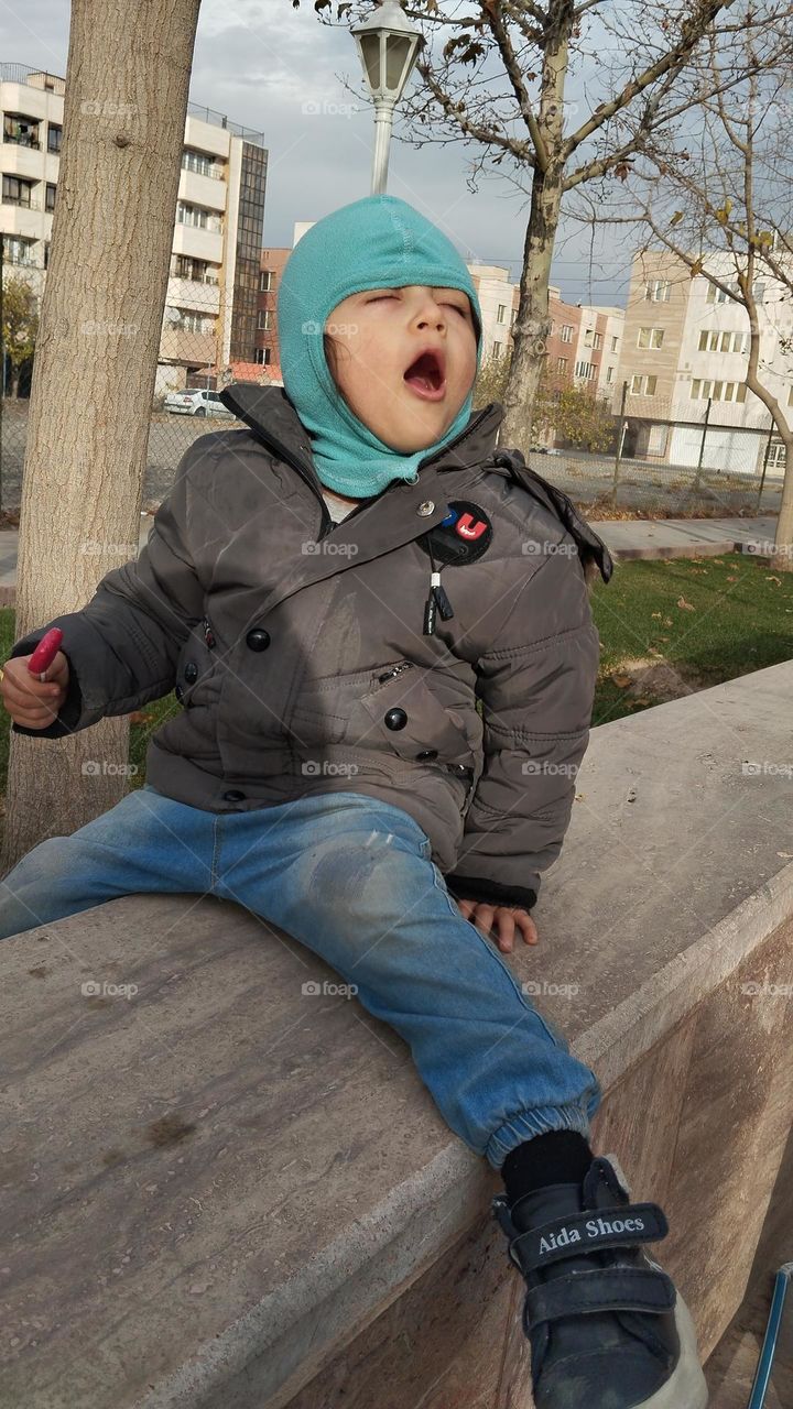 When his dad is not at home ,we both have special programs and hobbies with each other He has so many fun with his dad too . One of my hobby and his is going to the park ,once his mood was really perfect and he was singing for me so l took his photo