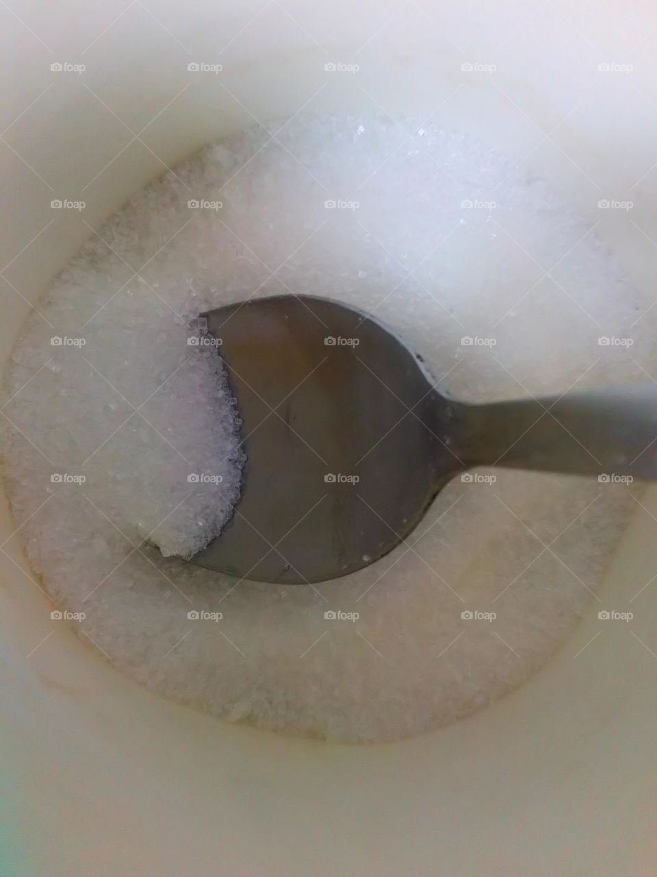 a lot of sugar in a mug