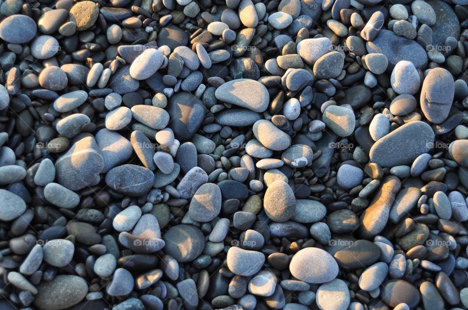 light And shadow on the stones on peddle beach