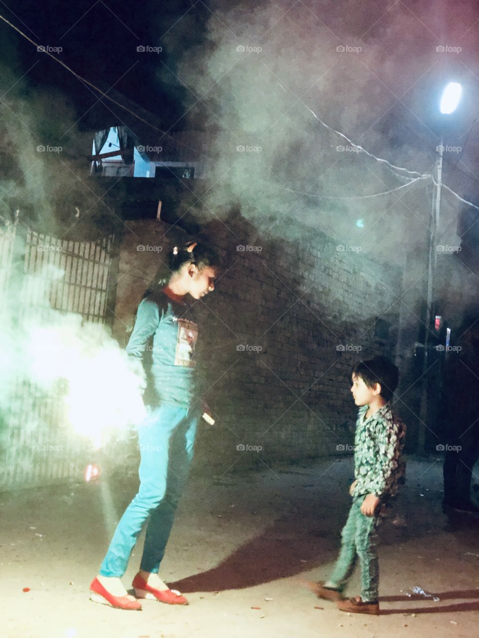 Two kids having fun, Diwali 2018 India, light it up kiddies 