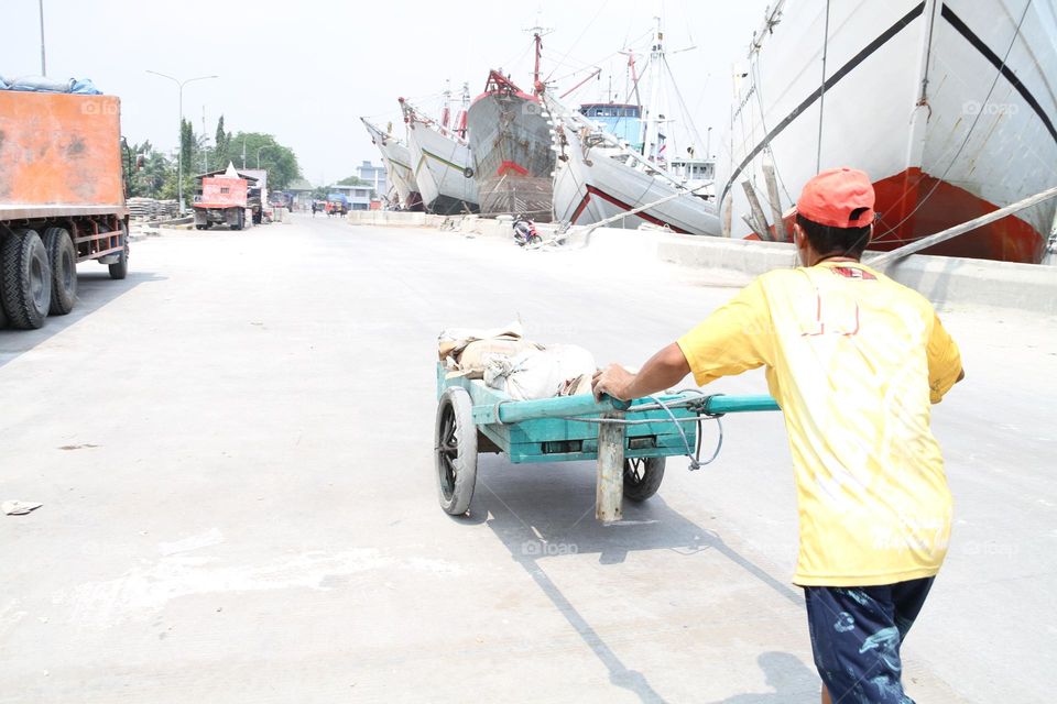 manual laborer at the harbor.