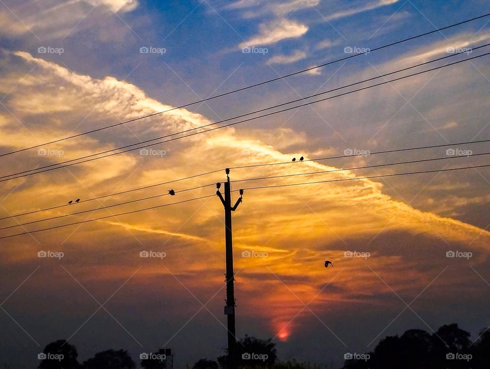 a picture of sunset background in India