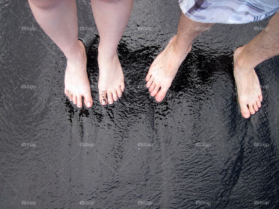 Two sets of feet in Hawaii 