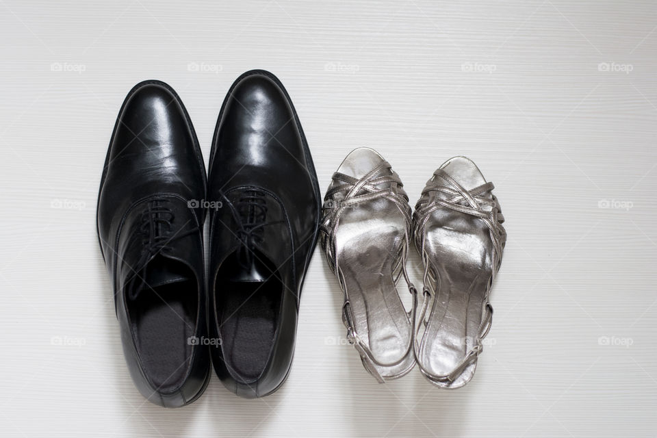 male and female elegant wedding shoes form above