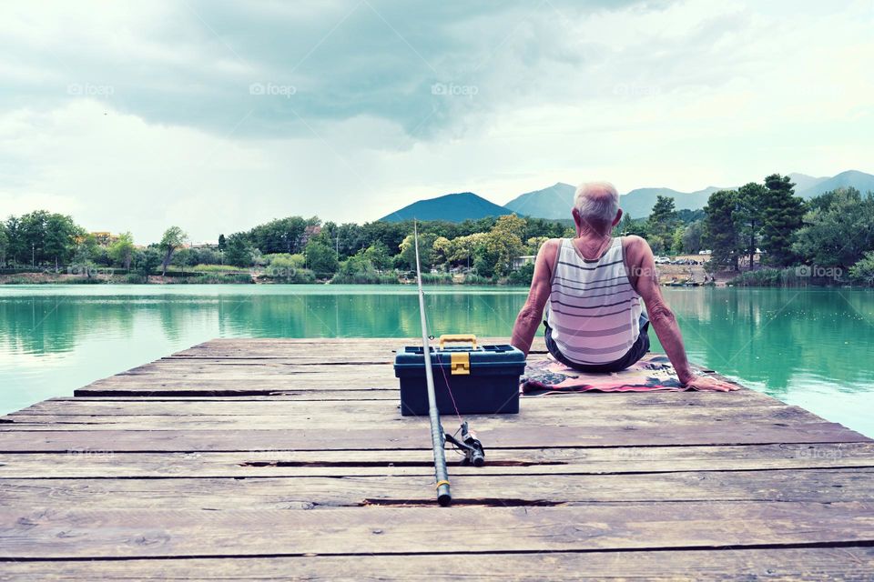 man fishing at the lake