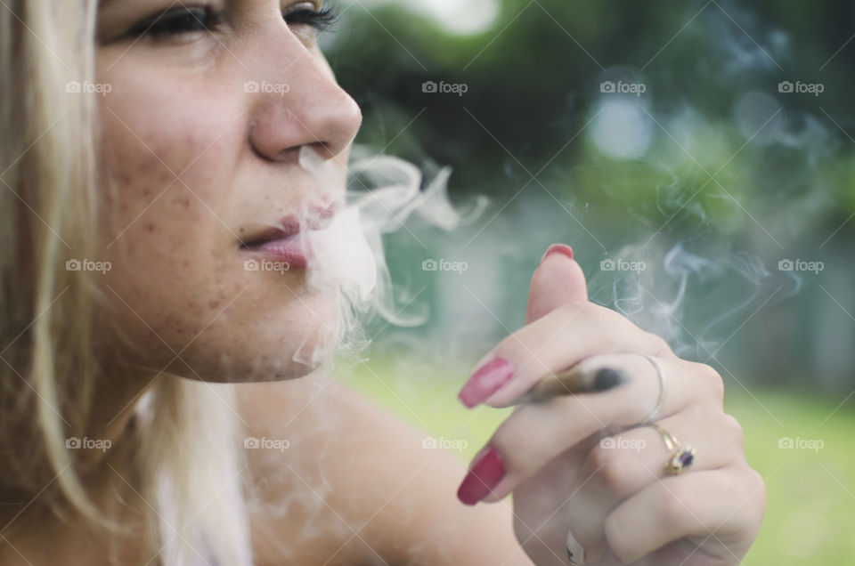 Woman smoking a joint