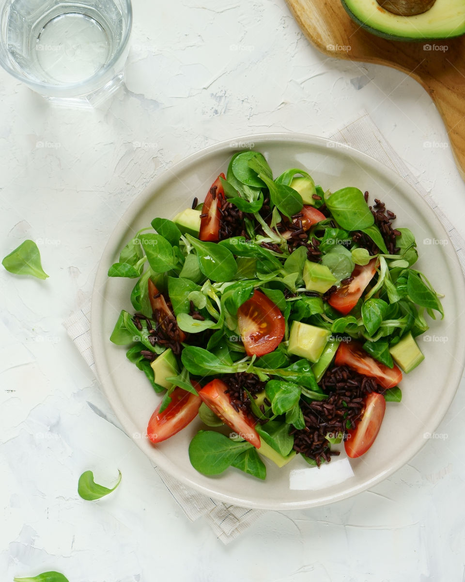 View of green salad on plate