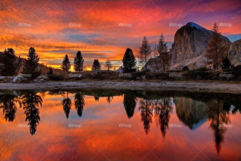 Beautiful mountain and lake scenery with sun set