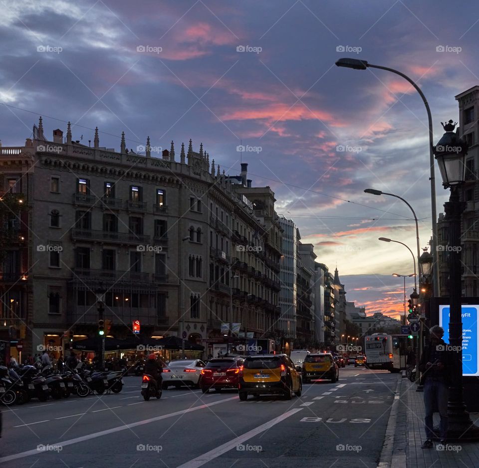 Barcelona Downtown with Clouds at the Sunset