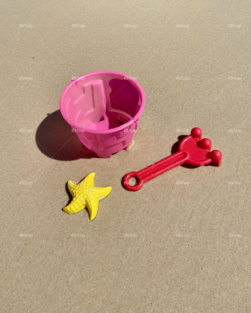 Toys on the sand on the beach