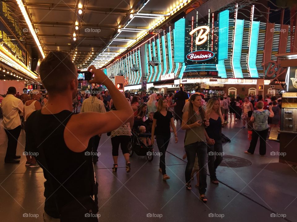 Man takes a Photo of the crowd 