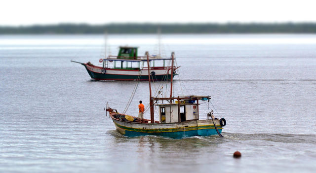 ocean water boat fishing by riksen