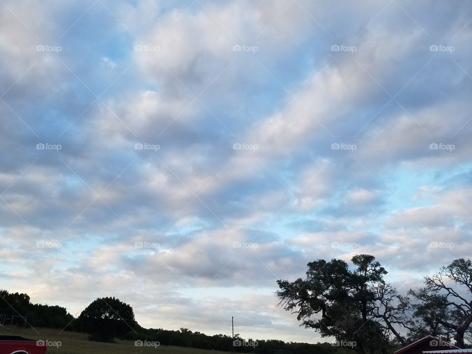 Just a beautiful Texas blue sky draped with clouds.