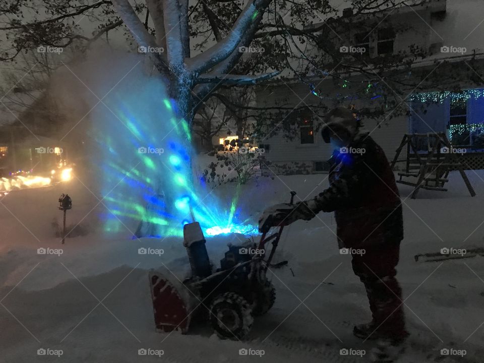 Snow blowing in the Christmas light 