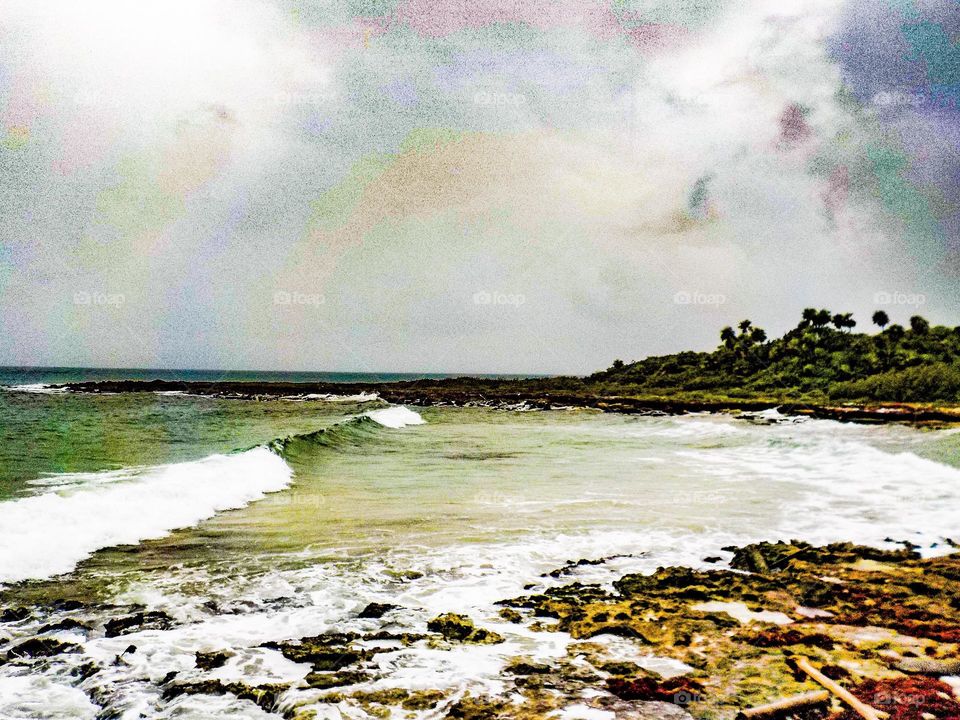 waves crashing against the shore in Mexico