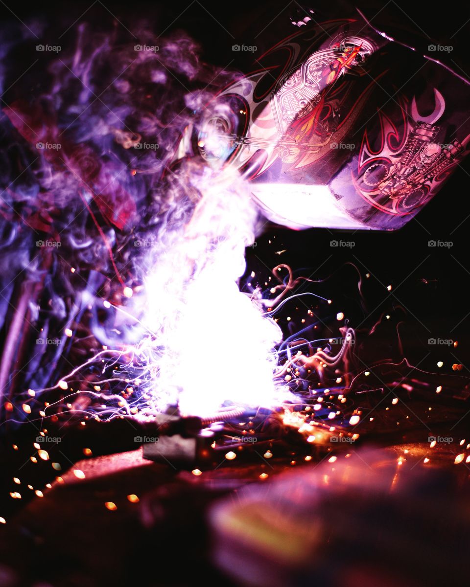 my friend welding in his shop