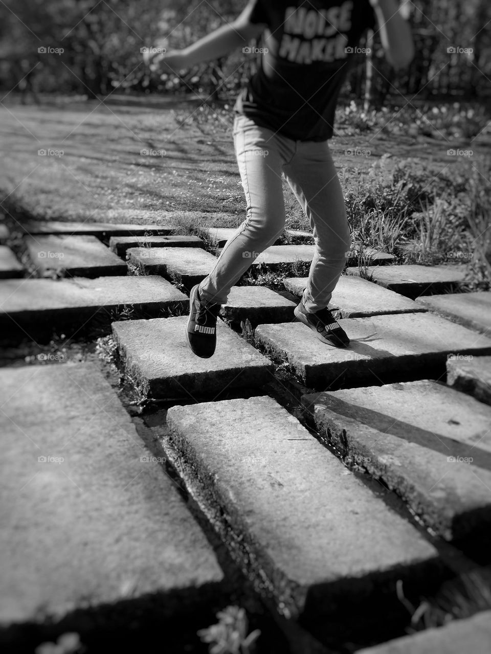 A child playing hopscotch