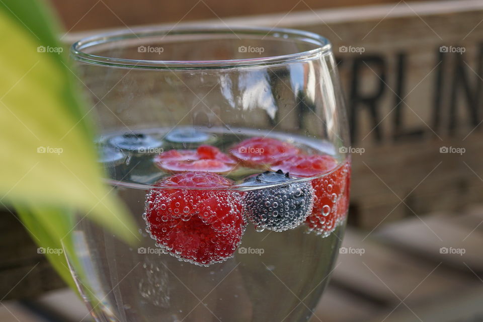 Fruits fizzing in a glass