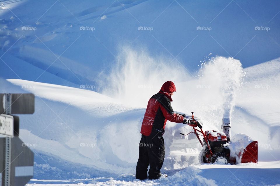 Man with Snow Blower