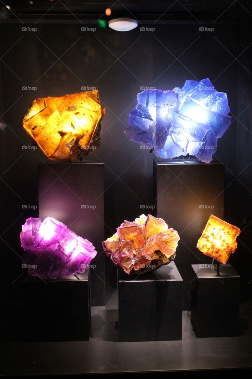 Colors in the earth. Lighted rocks in science museum