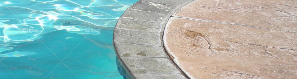 Hotel poolside view of tranquil blue water