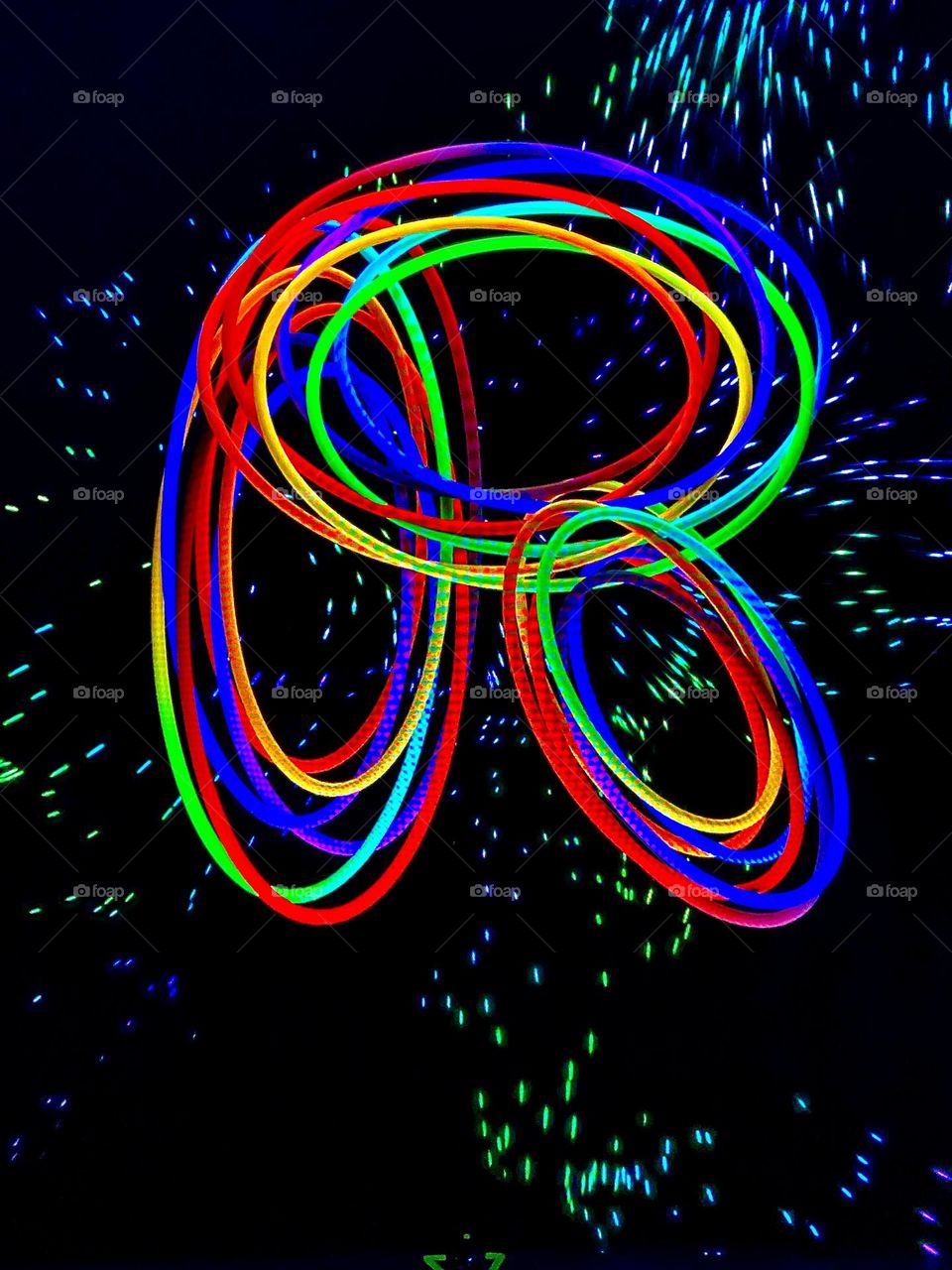 multi-colored rings in the dark, multi-colored spirals in the starry sky, spirals, stars, space,