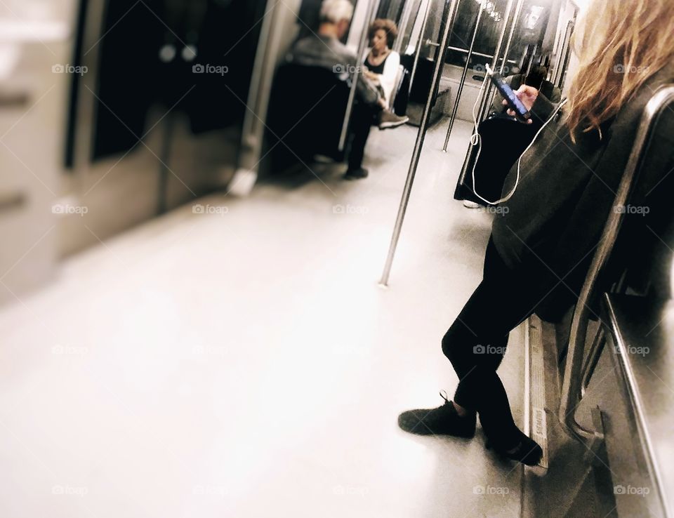 young woman chat with mobile phone in the train