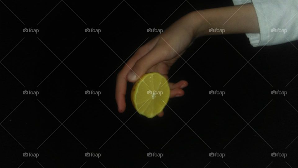 Little Hand Squeezing Lemon