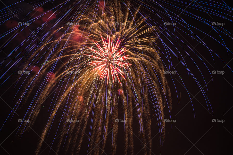 Exploding fireworks in the sky. Exploding fireworks in the sky on the Fourth of July in Brookfield, Wisconsin
