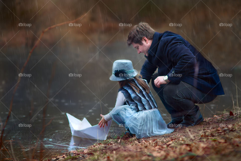 Father and daughter with super boat at spring park 