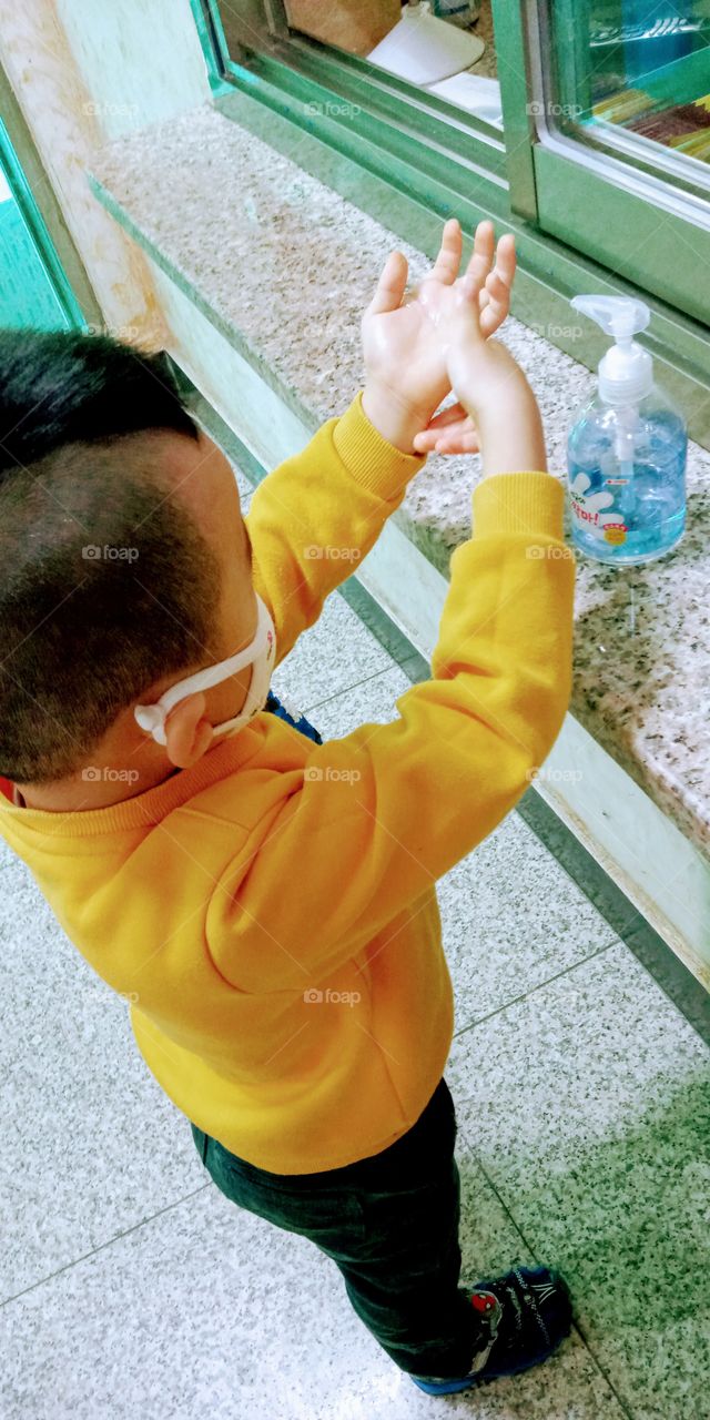 having fun with my little boy.
since there is corona virus around the world its very important to clean our hands. 
we do game and the loser should clean their hands.
he clean his hand nicely.😊
